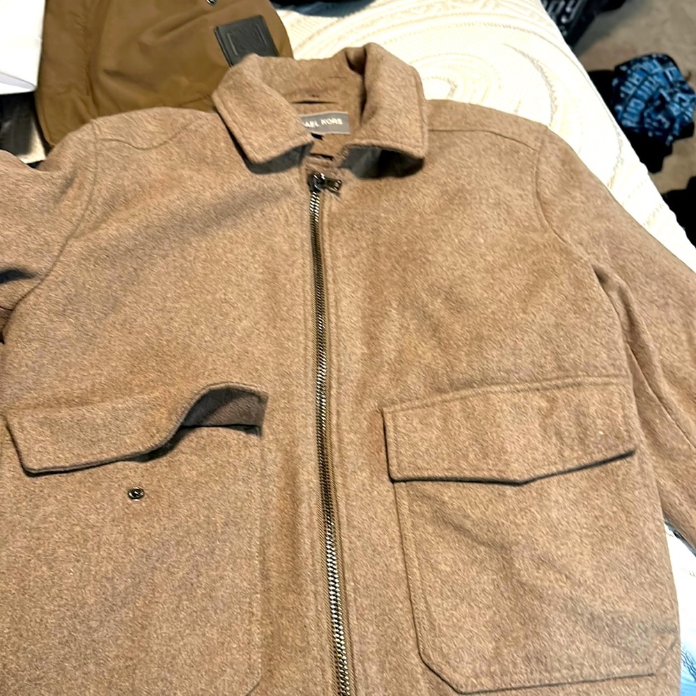 New jacket no tags just tried on put away doesn’t fit anymore